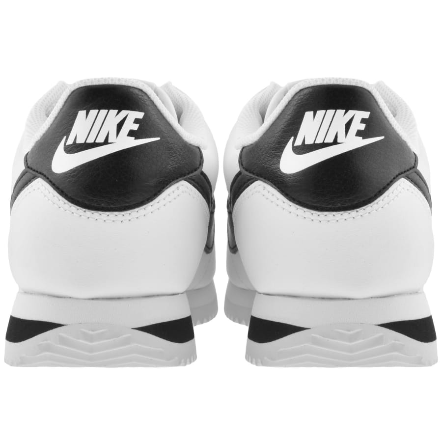 Nike cortez leather trainers in white with black swoosh store
